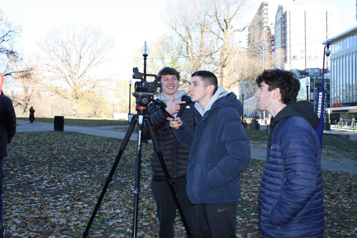 Braintree High Student Press members test their camera gear before making the trek to Cafe 26